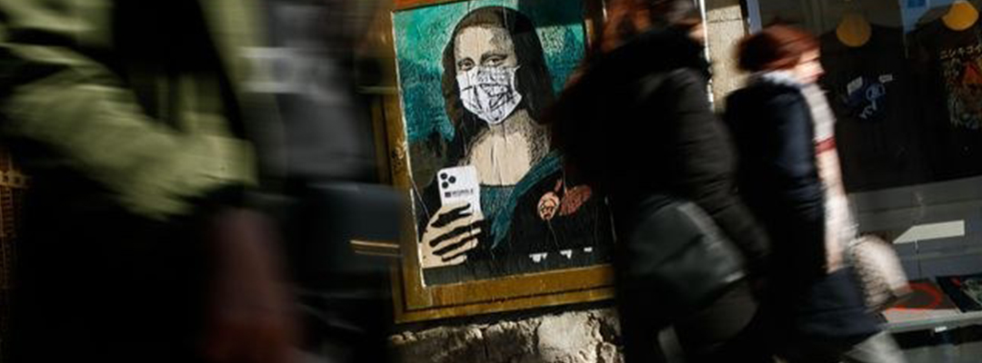 En una calle de Barcelona, un grafitti de la Mona Lisa de Leonardo da Vinci con tapabacas, en tiempos del coronavirus. Foto Afp