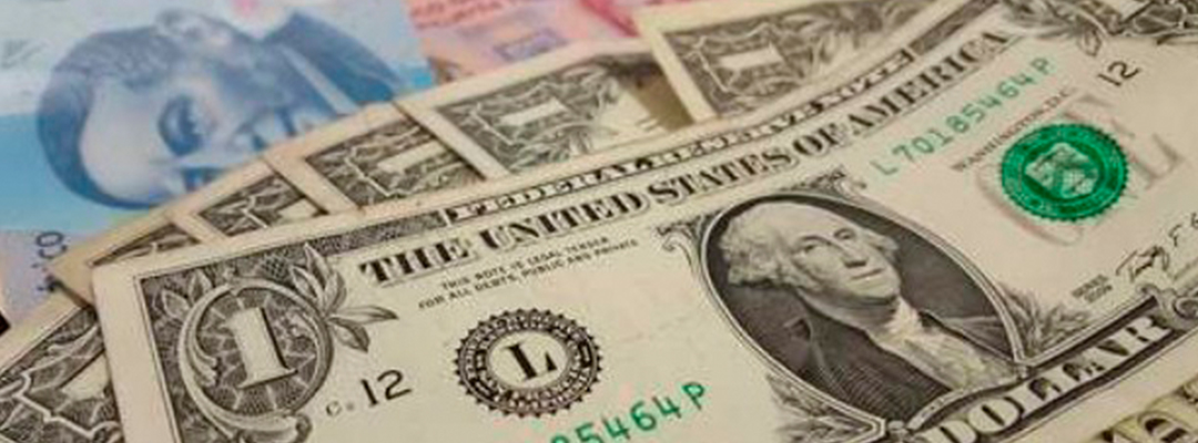 El tipo de cambio podría seguir su tendencia a la baja hacia el nivel clave de 21.00 pesos por dólar. Foto José Núñez/ archivo
