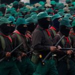 Pie de Foto.- Integrantes del Ejército Zapatista de Liberación Nacional, durante el mensaje del 26 aniversario, en el caracol de Morelia, cerca de Altamirano. Foto Afp / Archivo