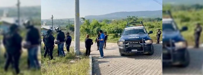 Pie de Foto.- Policías y agentes de la FGE acuden al sitio del asesinato para realizar las diligencias correspondientes. Foto 'La Jornada'